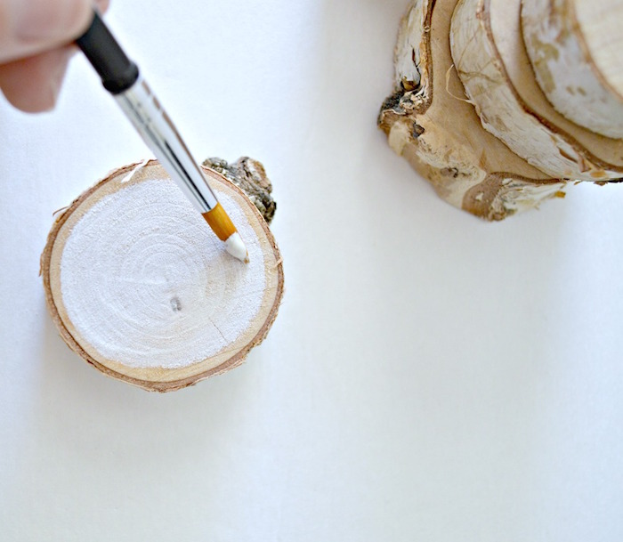 step by step diy tutorial for birch wood ornaments christmas tree ideas 2020 wood being painted white