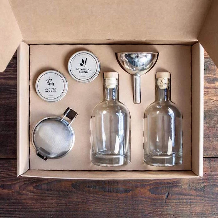 wooden surface christmas gift ideas for dad carton box placed on it with homemade gin kit