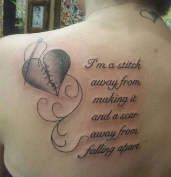 im a stitch away from making it and a scar away from falling apart broken heart tattoo back tattoo
