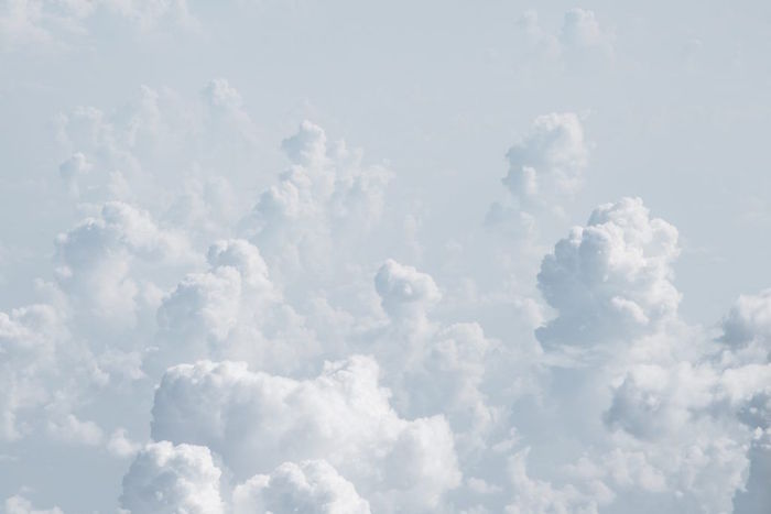 lots of white clouds in the sky minimalist background gray aesthetic foggy sky