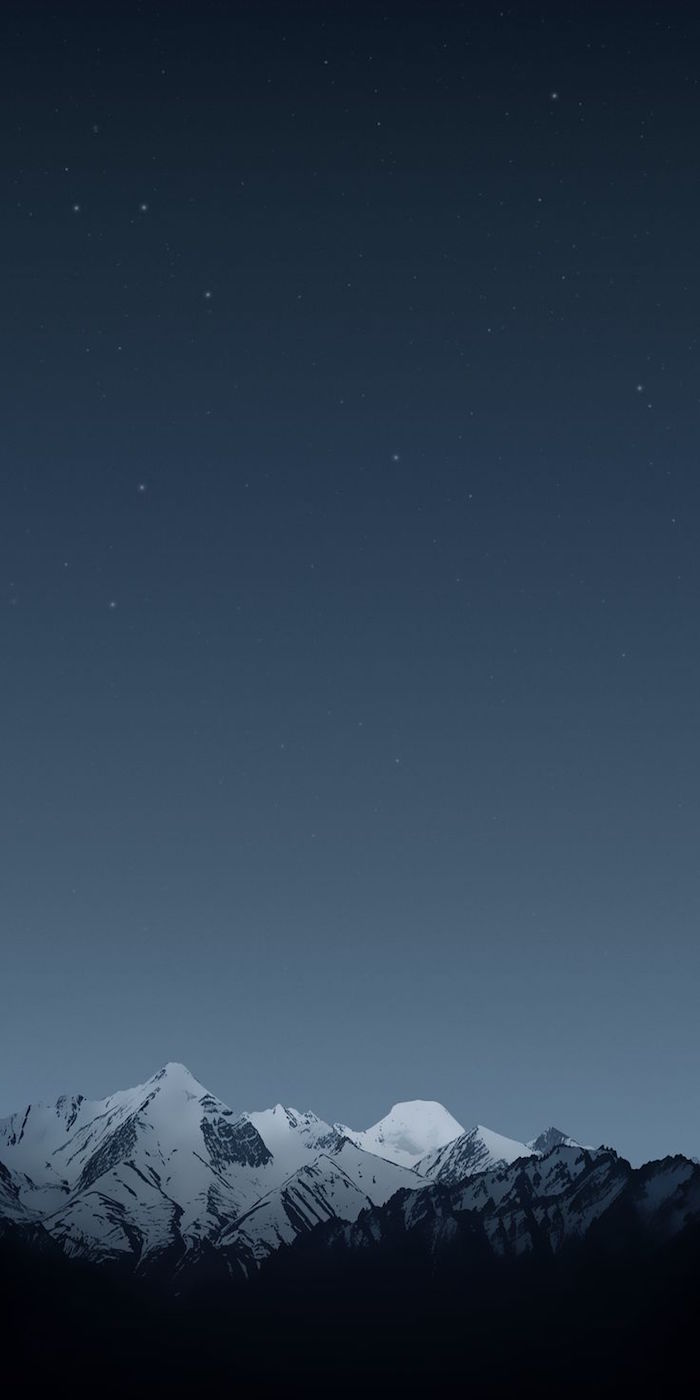 minimalist desktop backgrounds dark night sky above mountain range covered with snow photo