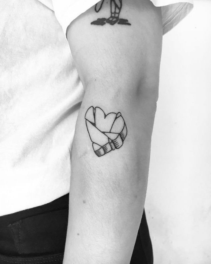 tattoo on the side of the arm broken heart tattoo black and white photo heart into pieces