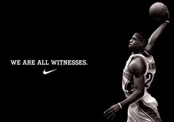 black background nike wallpaper iphone lebron james holding a basketball we are all witnesses written in white above nike logo