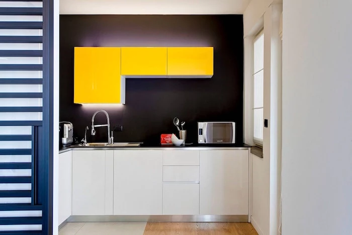 black backsplash yellow kitchen cabinets with led lights small kitchen remodel ideas wooden floor