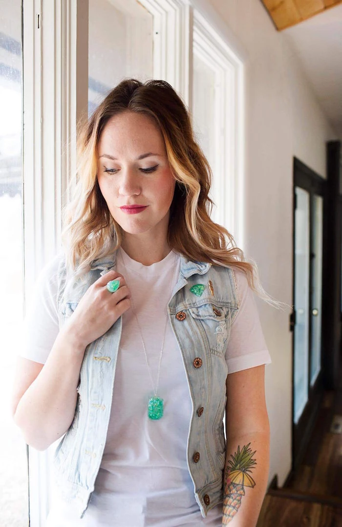 blonde woman wearing white shirt denim vest resin jewelry kit ring necklace and pin made of turquoise resin