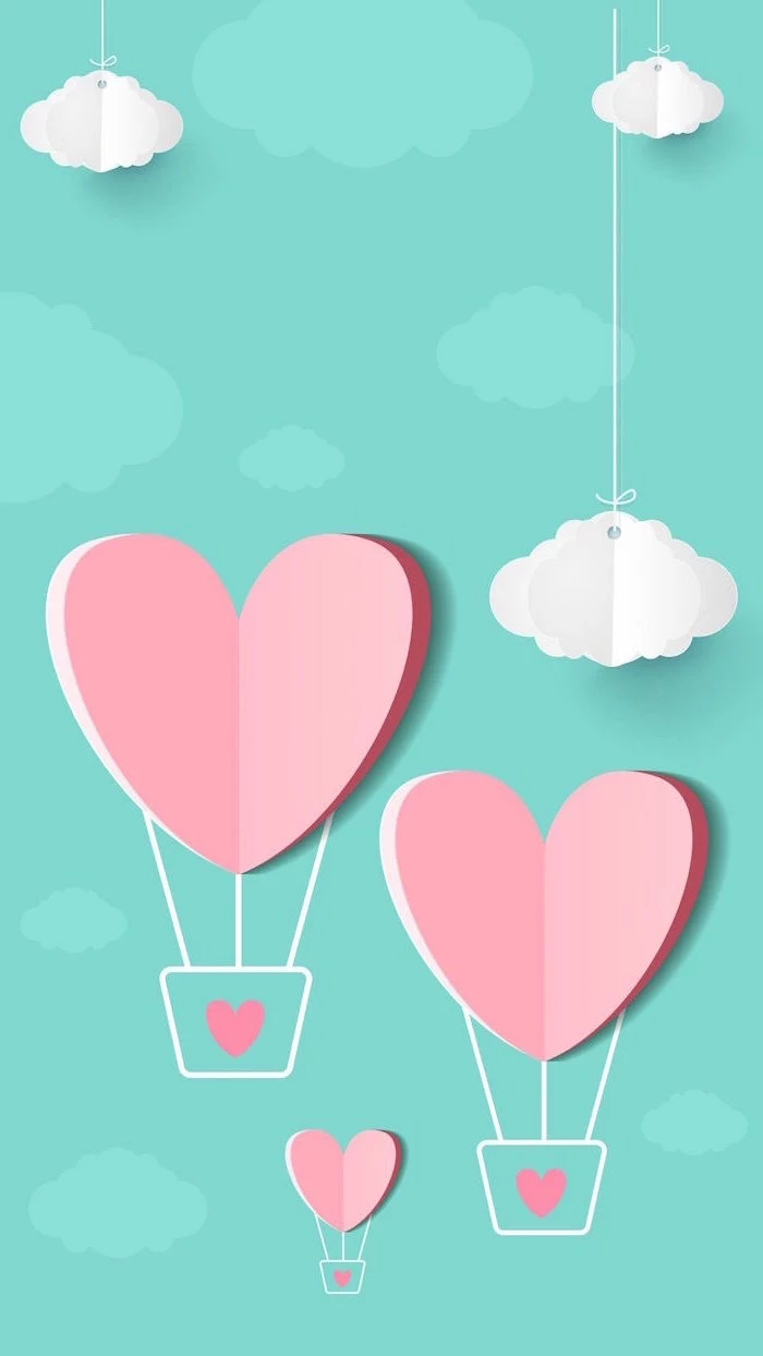 blue background with white clouds valentine's day 2021 three pink heart shaped hot air balloons