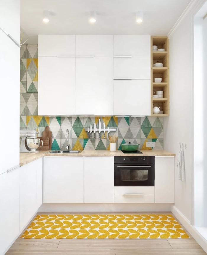 blue green yellow gray backsplash tiles white kitchen cabinets wooden countertops small kitchen design ideas