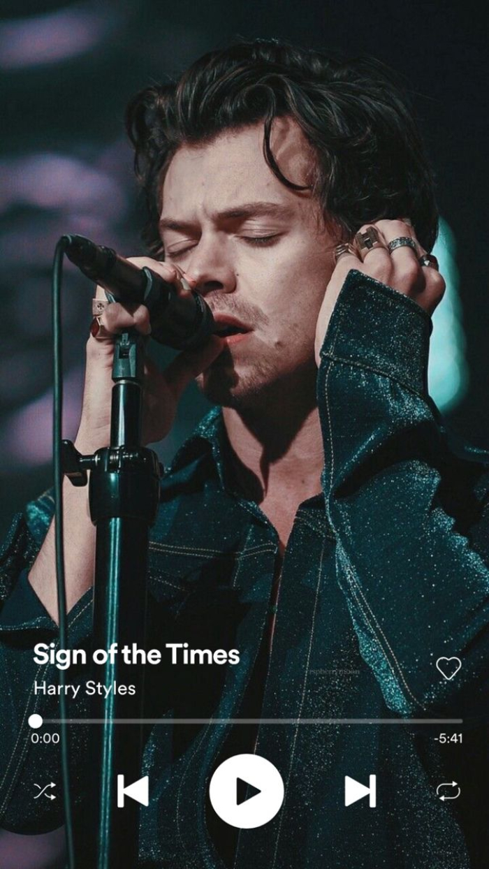 collage of photo of harry singing on stage wearing green suit harry styles aesthetic spotify screenshot playing sign of the times