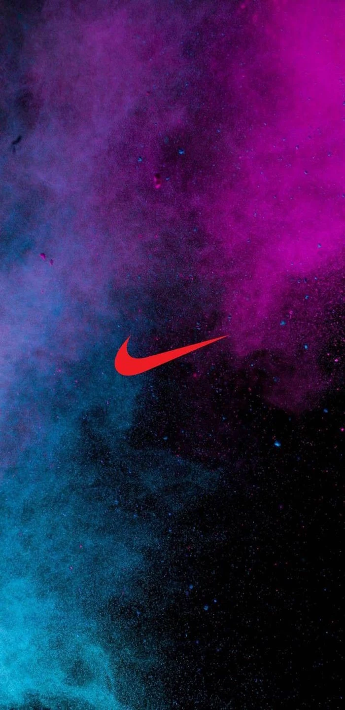 just do it wallpaper orange nike logo in the middle galaxy sky in the background in pink and turquoise