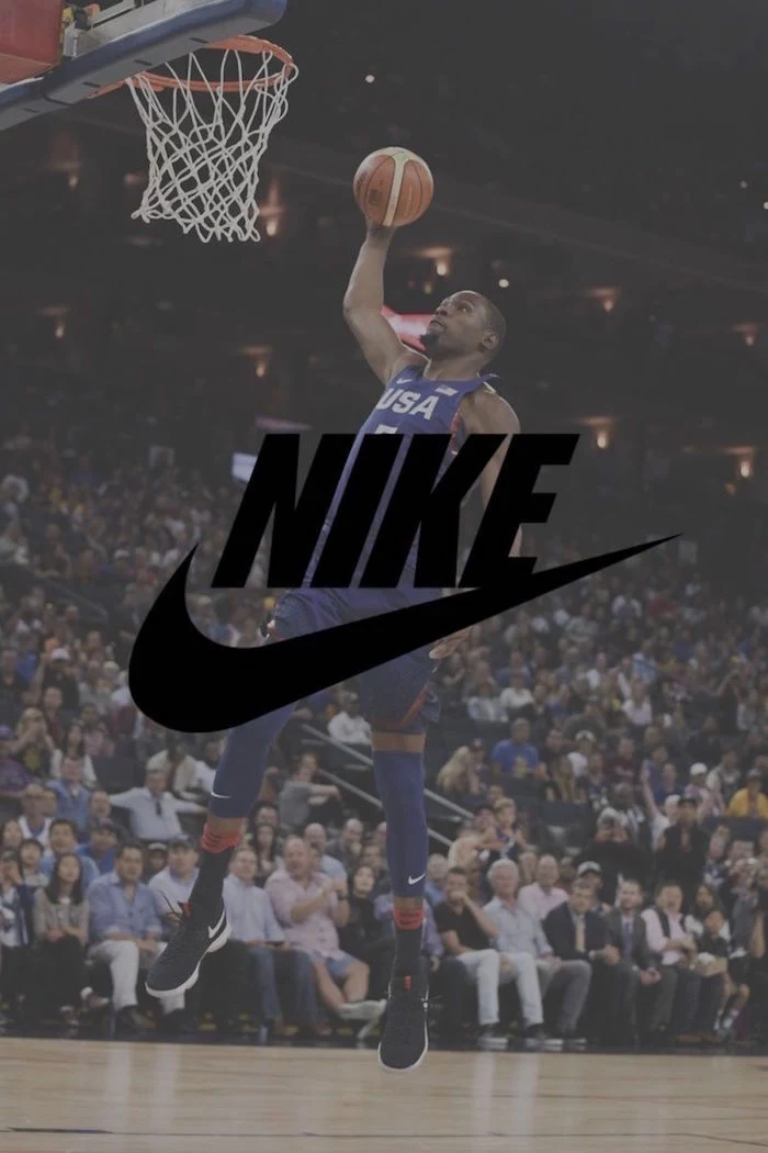 kevin durant wearing usa uniform in blue on the court about to dunk the ball nike logo wallpaper black nike logo in the middle