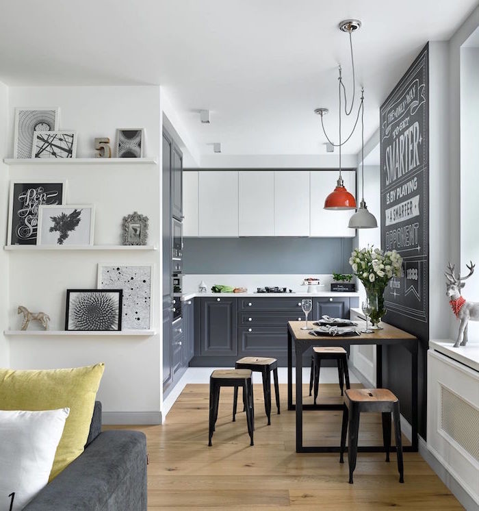 kitchen cabinet ideas gray backsplash white and black cabinets white countertop wooden floor wooden bar stools