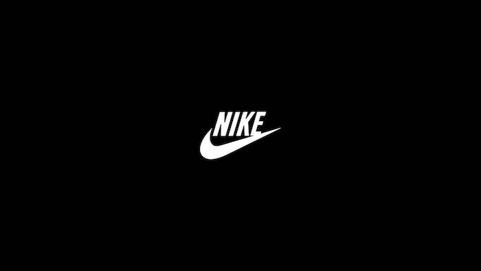 white nike logo black background