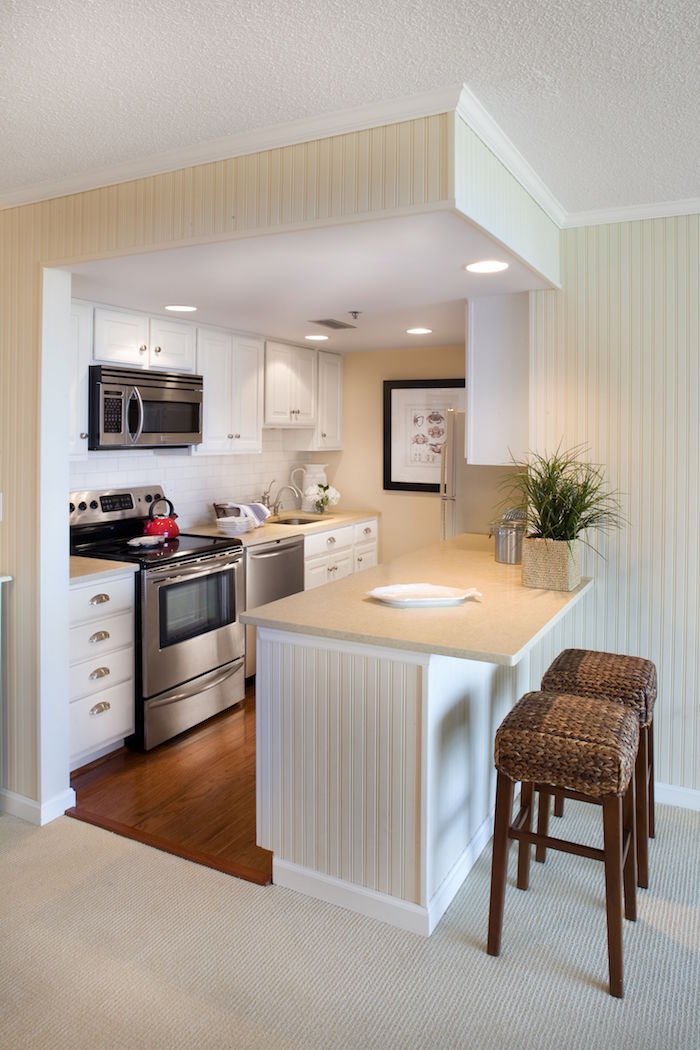 open plan kitchen with white kabinets small kitchen ideas white subway tiles backsplash wooden floor small kitchen island