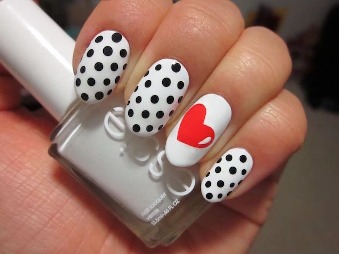 red heart and black dots on white nail polish cute nail designs medium length almond nails