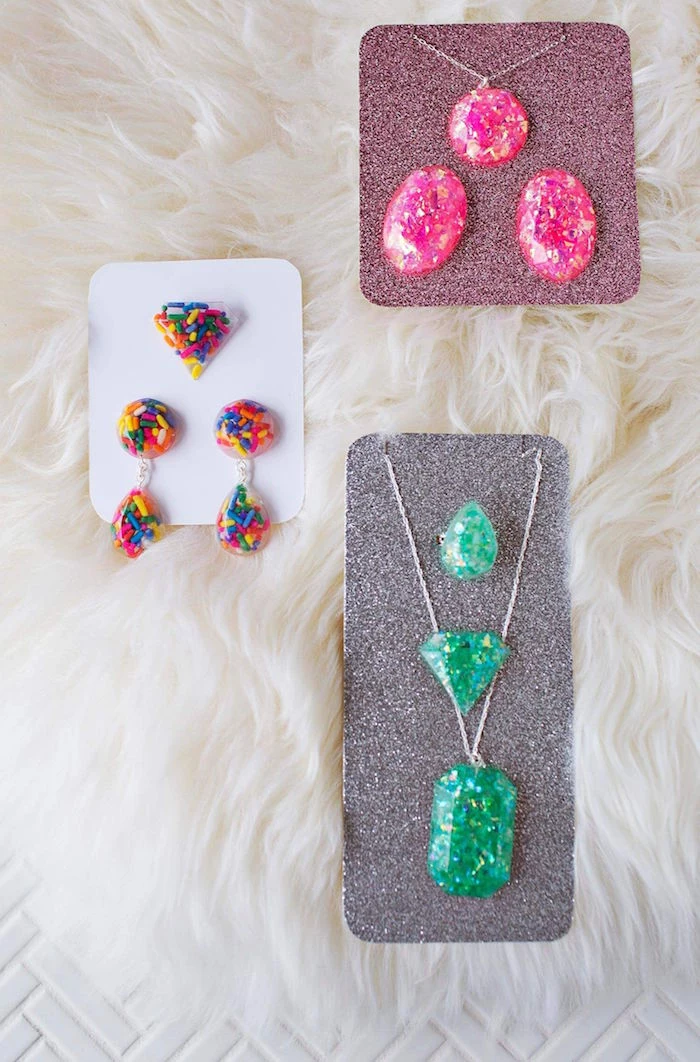 rings necklaces and earrings made of resin how to make resin jewelry pink green and colorful ones