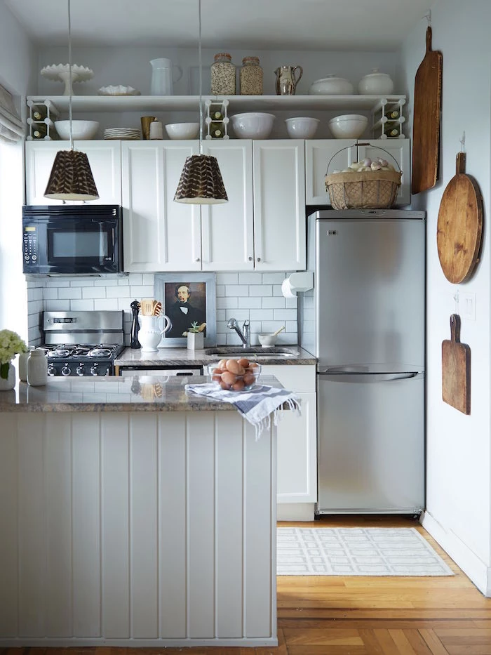 rustic style kitchen with white kitchen cabinets open shelving small kitchen ideas granite countertop white subway tiles backsplash