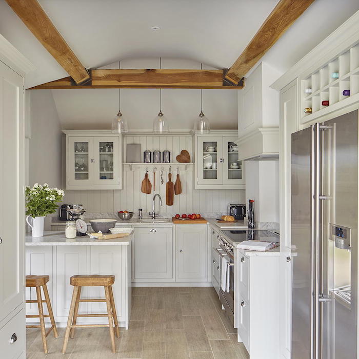 rustic style kitchen with white shiplap backsplash white cabinets wooden bar stools kitchen decorating ideas