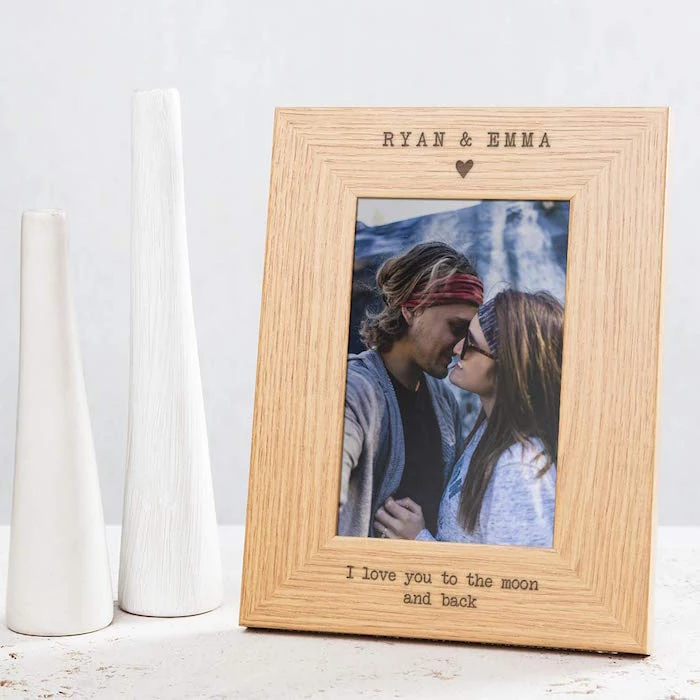 ryan and emma i love you to the moon and back engraved on wooden frame valentine's day gifts for men photo of couple kissing