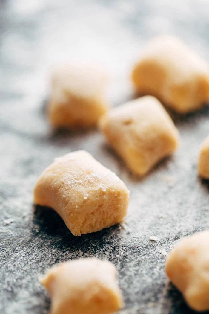 sweet potato gnocchi step by step diy tutorial recipes using gnocchi cut into cubes placed on floured surface
