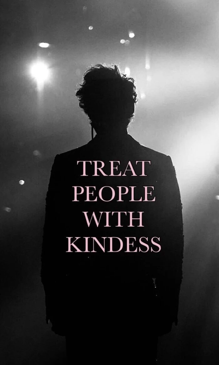 treat people with kindness written in white harry styles laptop wallpaper black and white photo of harry on stage