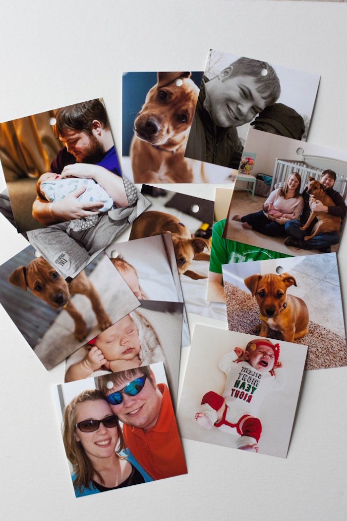 valentine's day gift ideas for him lots of photos spread on white surface valentine's day gift ideas for him couple with baby and dog