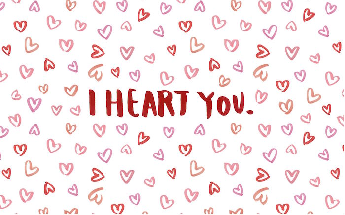 white background when is valentines day lots of hearts drawn on it in red and pink i heart you written in red in the middle