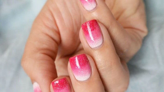 white pink red glitter ombre valentines day nail art medium length square nails white background