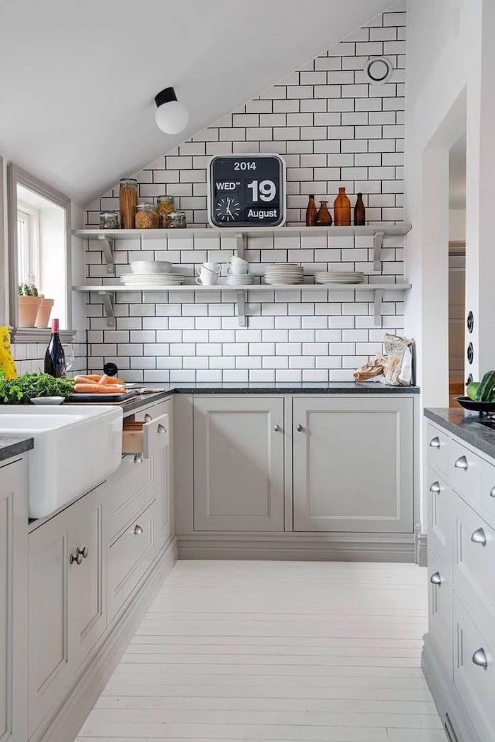 white subway tiles baacksplash open shelving white kitchen cabinets dark gray countertop small kitchen ideas rustic style