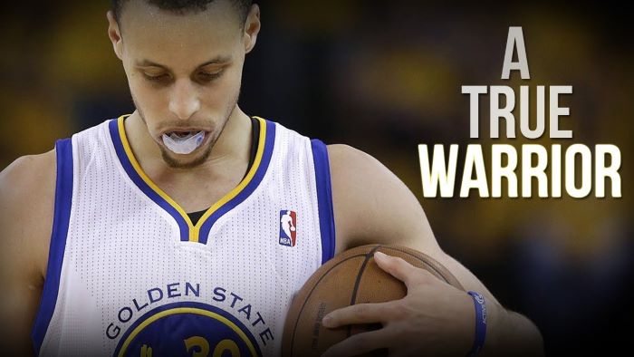 a true warrior written next to photo of steph curry on the court golden state warriors wallpaper holding basketball