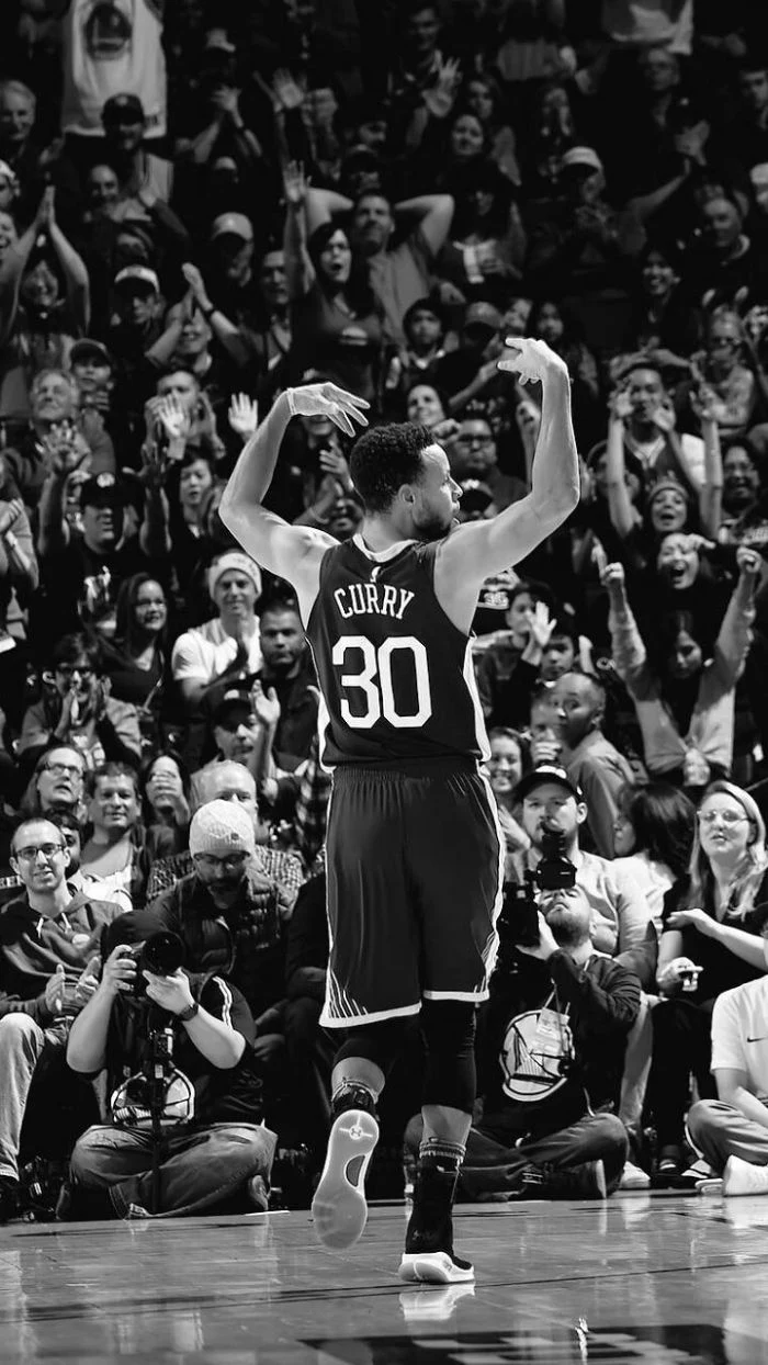 black and white photo of steph on the court hyping the crowd stephen curry wallpaper 2021