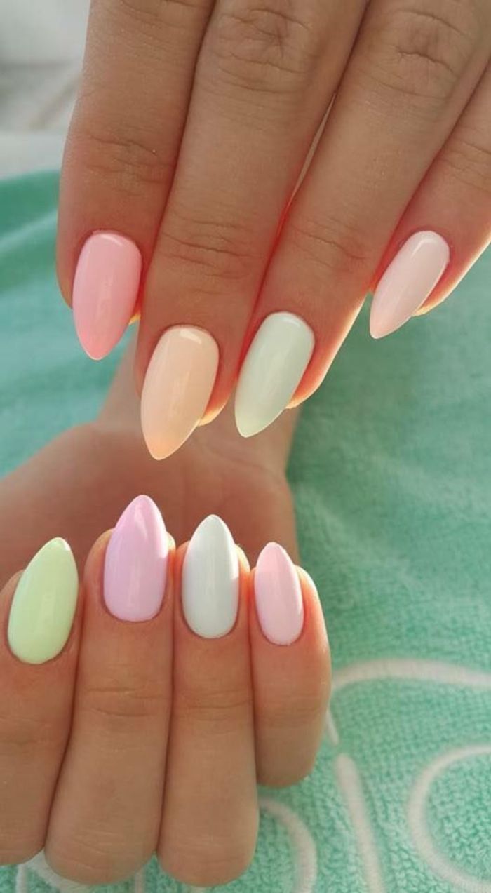 blue purple green yellow light pastel nail polish on medium length stiletto nails 2021 nail trends