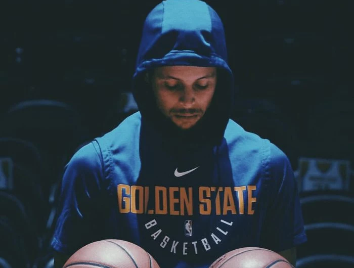 blue warriors hoodie warn by stephen curry basketball pictures wallpaper holding two basketballs
