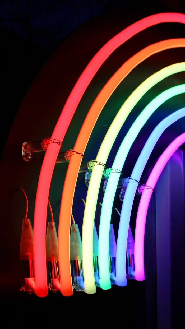 bright neon lamp in the shape of a rainbow cool rainbow wallpapers glowing in red orange yellow green blue and purple