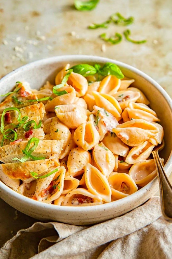 chicken and bacon pasta with creamy sauce how to make homemade pasta placed in white bowl
