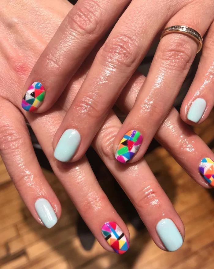colorful geometric designs on index and ring fingers nail designs for short nails blue nail polish