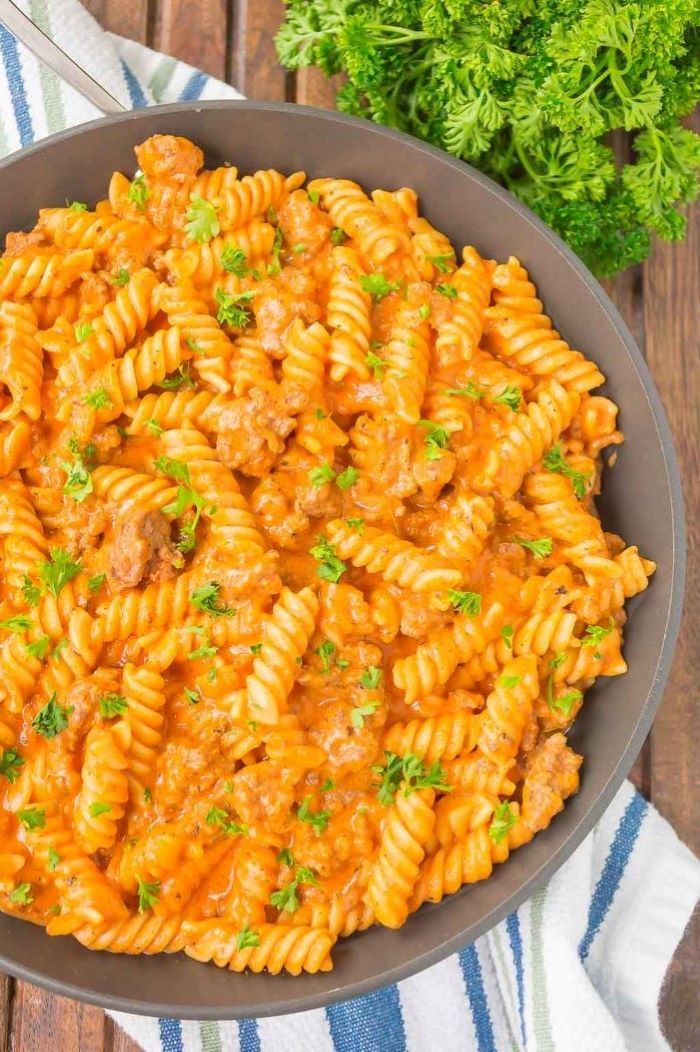 creamy sauce with ground beef best pasta dishes pasta cooked in gray saucepan palced on blue and white cloth