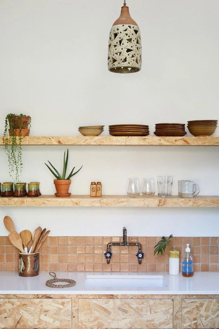 floating shelves kitchen ideas brown tiles backdrop wooden shelves with brown plates white countertop