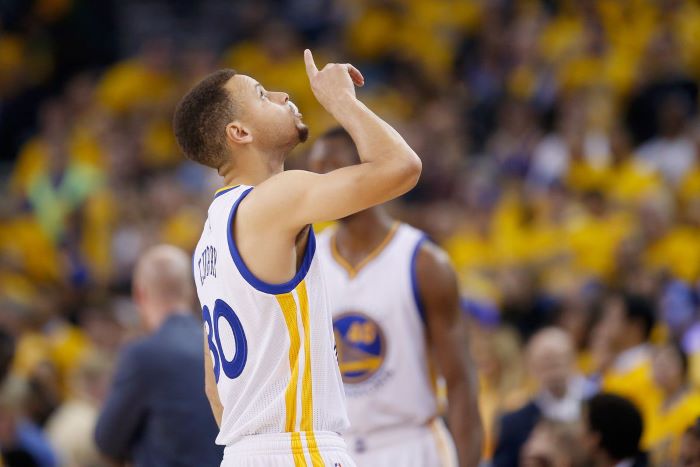 golden state warriors wallpaper steph curry doing his celebration on court wearing white warriors uniform