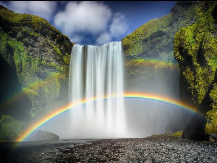 pastel rainbow wallpaper digital drawing of waterfall falling from tall rocks two rainbows underneath
