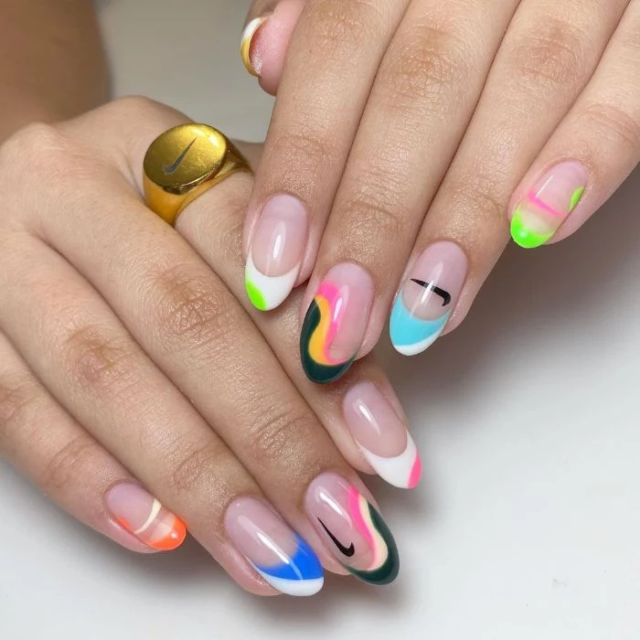 spring nail designs abstract french manicure in different colors with two nike logos long almond nails