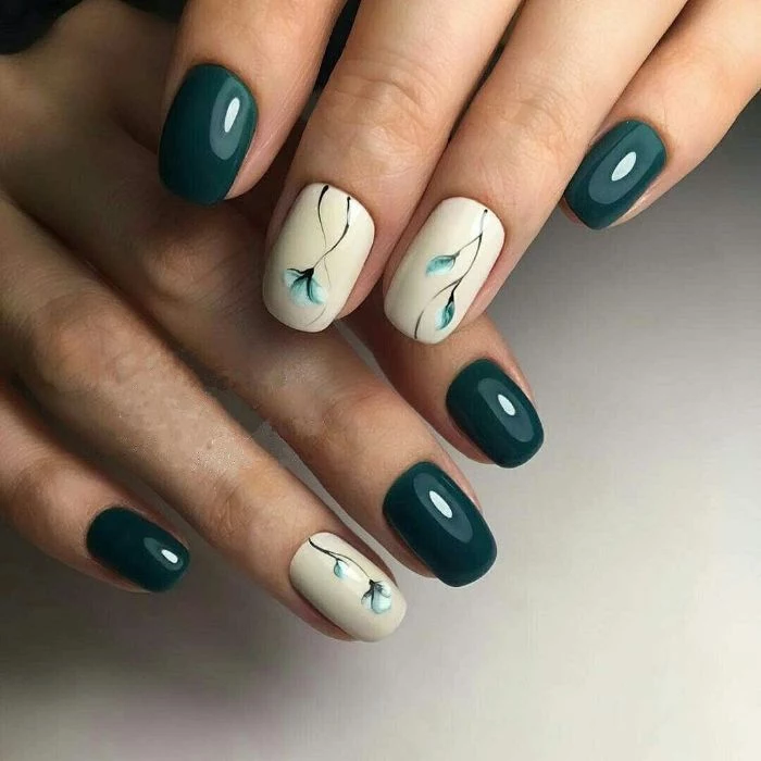 white and green nail polish simple nail designs flower decorations on middle and ring fingers
