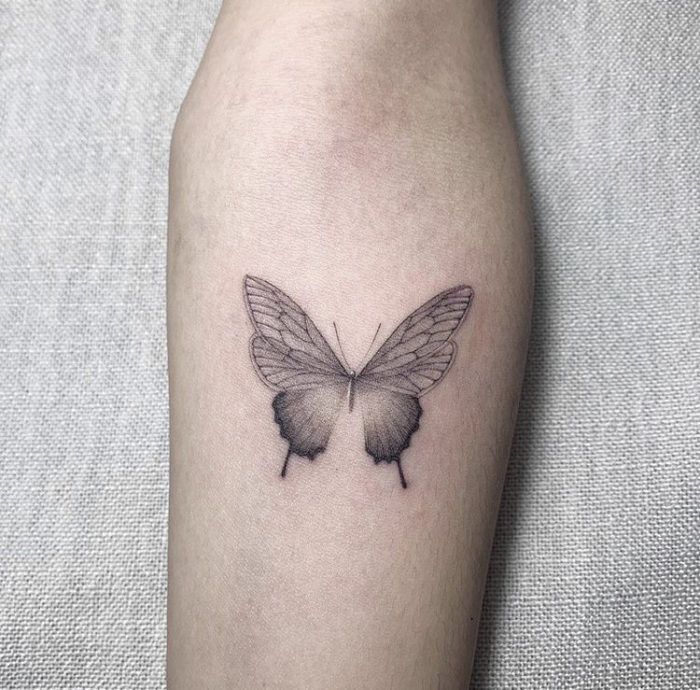 white background butterfly tattoo small black and white forearm tattoo