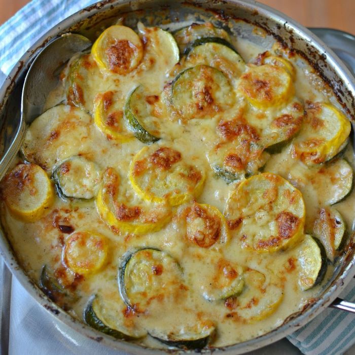 baked squash recipe baked gratin with squash and zucchini slices with lots of cheese on top