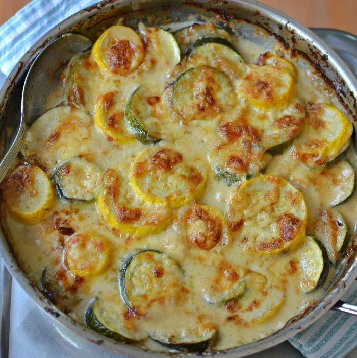 baked squash recipe baked gratin with squash and zucchini slices with lots of cheese on top