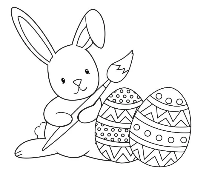 black and white drawing of bunny holding a paintbrush easter pictures to color two eggs in front of it