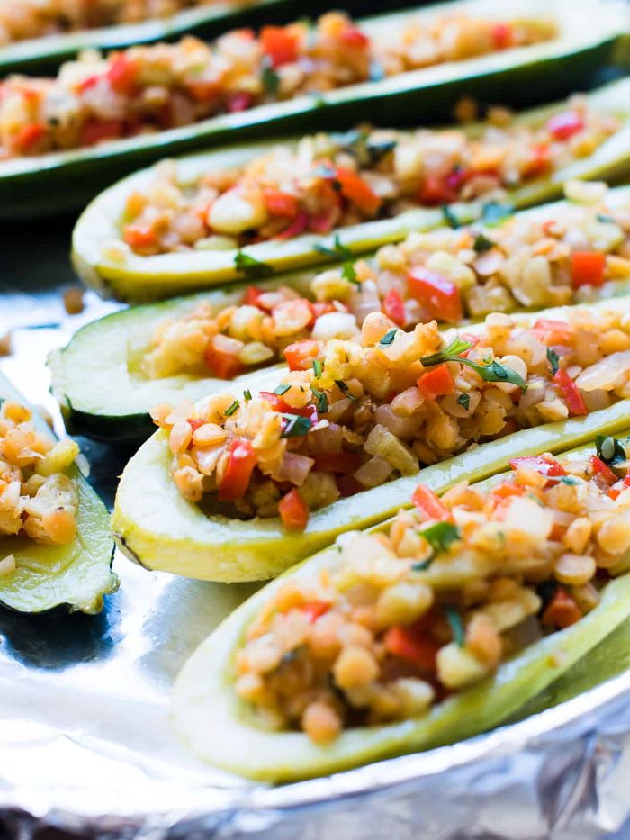 close up photo of summer squash stuffed with lentils and veggies how to cook squash and zucchini