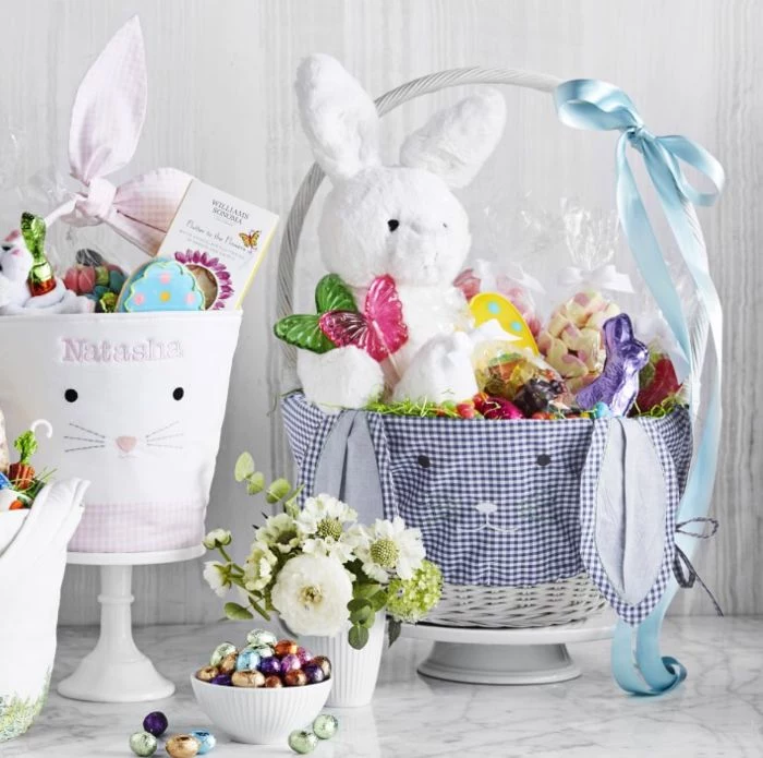 diy easter basket covered with fabric filled with stuffed toy chocolate bunny candy