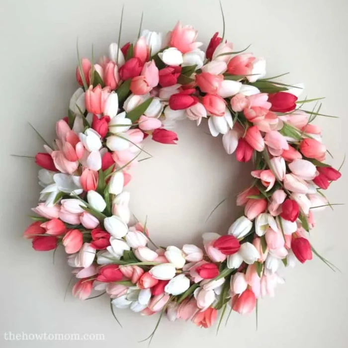 diy tulip wreath easter crafts for adults made with tulips in different shades of pink and white