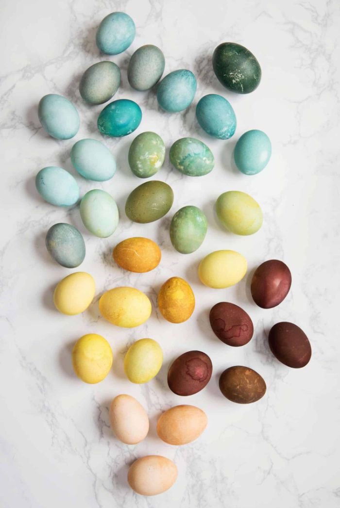 easter egg coloring lots of eggs scattered around marble surface all in different colors