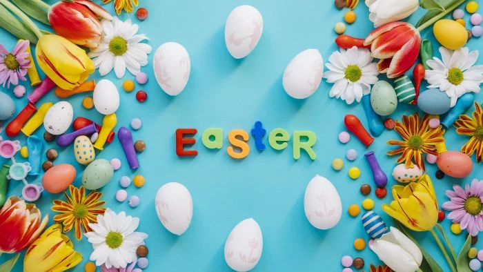 easter written on blue background easter wallpaper surrounded by easter eggs colorful flowers and balloons